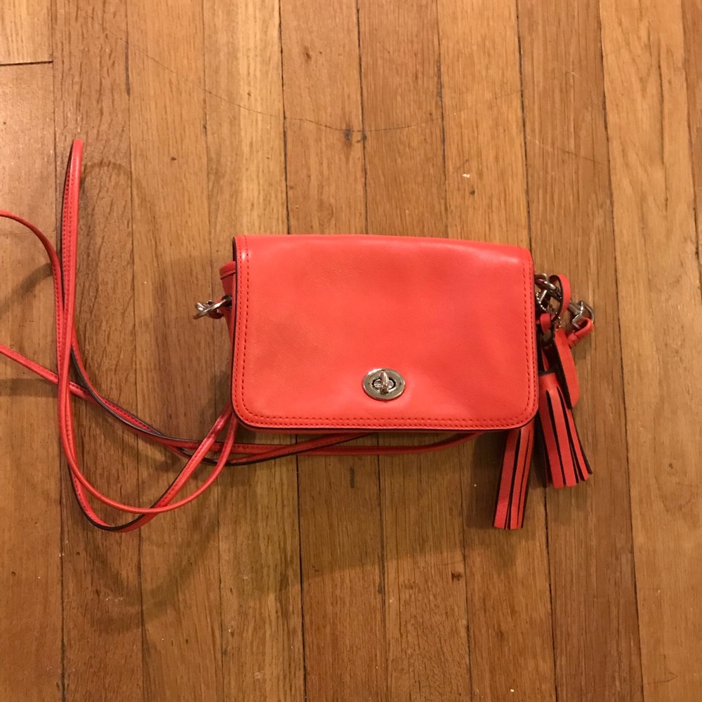 Coach coral crossbody bag w/ tassel